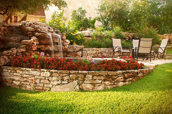 Elegant paver patio with seating wall and fire pit in Glendale CA